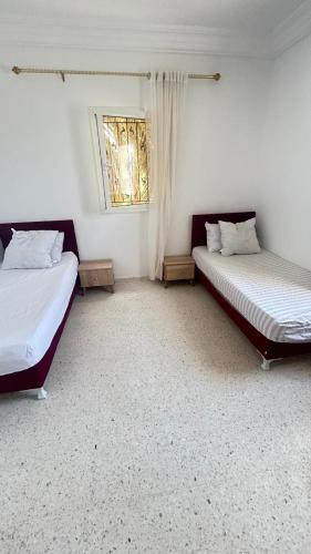 Кровать или кровати в номере Villa Djerba