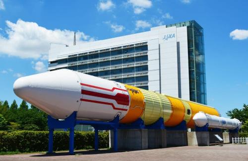 a building with a large inflatable rocket in front of it at Sirius AMA - Vacation STAY 20068 in Tsukuba