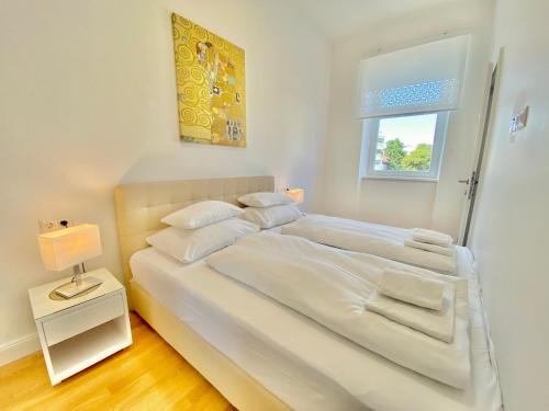 Cama o camas de una habitación en Steiner Residences Mödling
