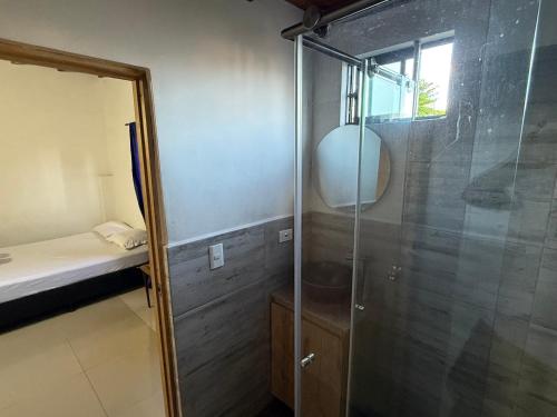 a bathroom with a shower with a glass door at Apartamento cómodo con excelente ubicación in Medellín
