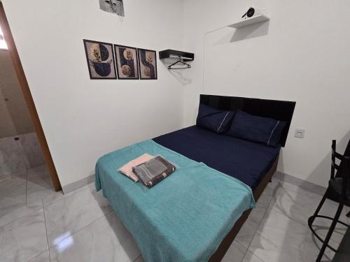Postel nebo postele na pokoji v ubytování Flat completo 16 minutos do Aparecida Shopping e Buriti