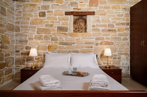 Ένα ή περισσότερα κρεβάτια σε δωμάτιο στο Villa eftichia