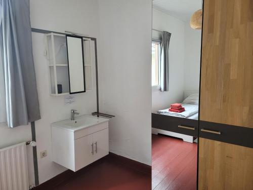 Ένα μπάνιο στο Ferienhaus im Moseltal