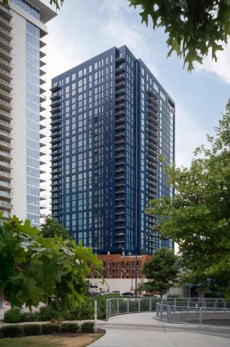 a tall building with many windows in a city at Kasa at The Waller Austin in Austin