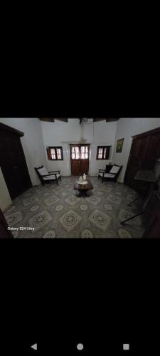 a large living room with a table and a couch at Della monica in Tinogasta