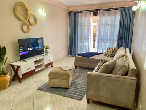 Fotografie z fotogalerie ubytování Cosy roadside apartment with fiber internet v destinaci Kampala