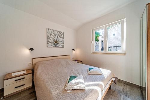 Postel nebo postele na pokoji v ubytování Seaside holiday house Borje, Peljesac - 24805