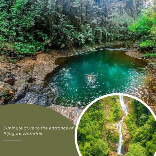 an aerial view of a pool of water in a forest at Ceibo Lodge in Bijagual