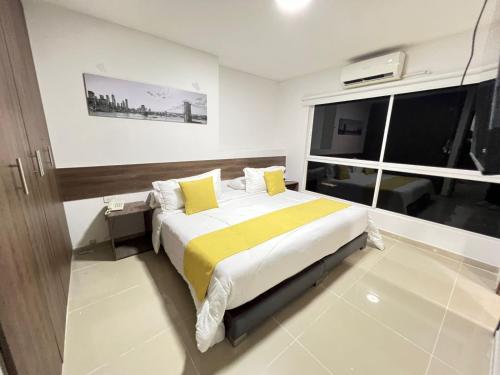 Letto o letti in una camera di Aparta Suites la Flora Flora-Piscina-Jacuzzi