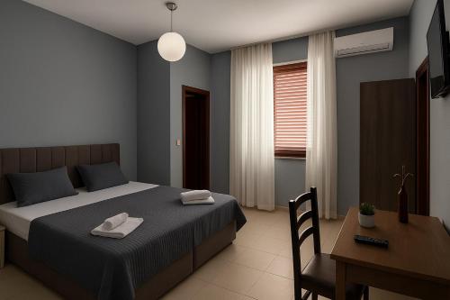 Ein Bett oder Betten in einem Zimmer der Unterkunft Sweet Dreams -Guesthouse
