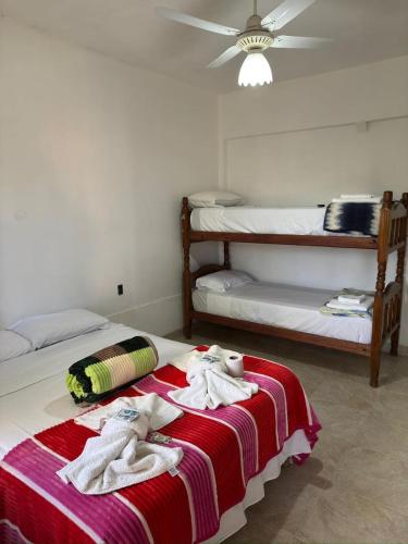 En eller flere senge i et værelse på Centro Resort