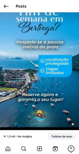 a screenshot of a website with a picture of a bay at Suítes Para Casal in Bertioga