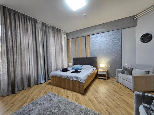 Postel nebo postele na pokoji v ubytování The Gem House Apartments - City Center