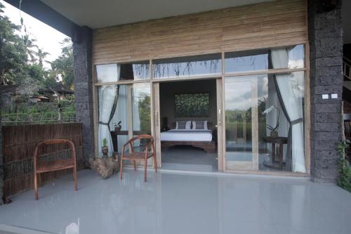 Balkón nebo terasa v ubytování Dukuh Ubud Villa