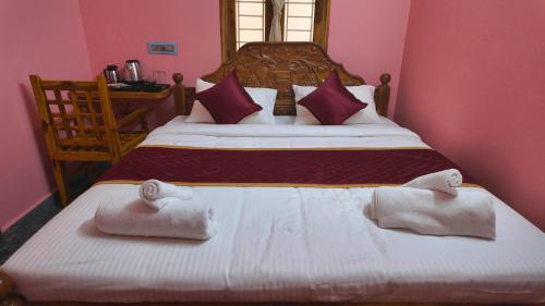 Katil atau katil-katil dalam bilik di Shree Residency