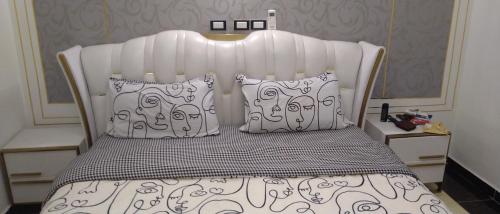 Cama o camas de una habitación en Mon Nid d'Or ABIDJAN CI
