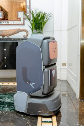 a whale themed electric dentist chair sitting in a room at The Pury Hotel in Yiwu