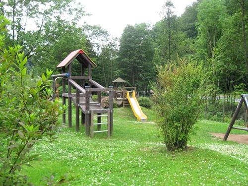 a park with a playground with a slide at Einfamilienhaus in Zorge in Zorge