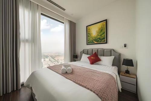 Katil atau katil-katil dalam bilik di Masteri West Heights Lakeview Apartments