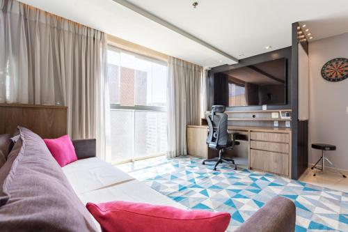 En eller flere senge i et værelse på Apt Premium Work & Stay dentro do shopping