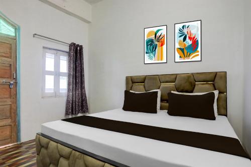Postel nebo postele na pokoji v ubytování Hotel O S1 Hotel Palace NH 19