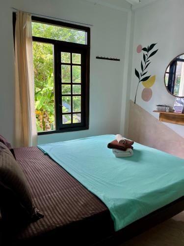 Ein Bett oder Betten in einem Zimmer der Unterkunft Salty Heart - Surf House