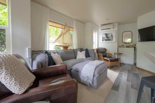 a living room with a couch and a chair at Beach Bungalow 4 in Cannon Beach