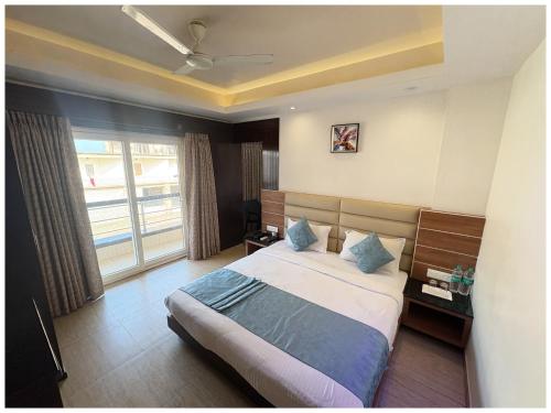 Hotel Palace Golden R-Rivera with Cafe & Swimming Poolにあるベッド