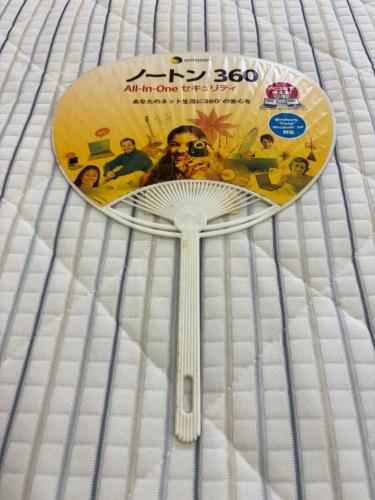 a dvd is sitting on a bed at 覚羅中央区別荘202室 in Chiba