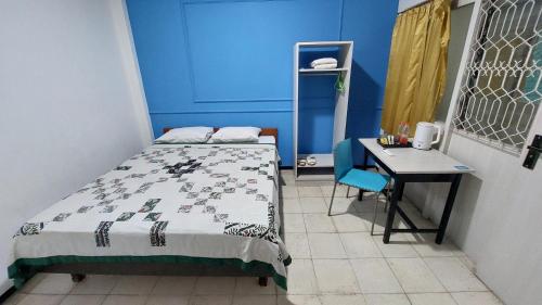 Una cama o camas en una habitación de Riche Heritage Hotel