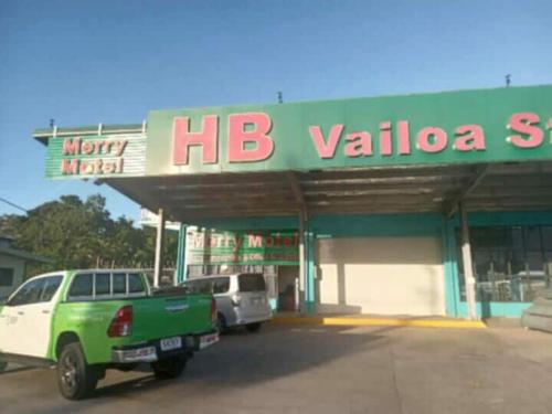 a hbc valida gas station with a truck parked in front at FINAU 685 Accommodations in Vaitele