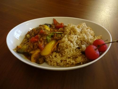 a white bowl of food with rice and vegetables at Twin Dome Ryugu in Hokuto