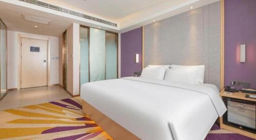 Letto o letti in una camera di Lavande Hotels Jinzhong Youjian Pingyao