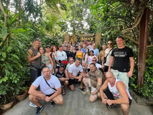 a large group of people posing for a picture at Bonny Hotel 4 Floors No Elevator in Lamai