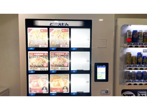 a vending machine with food and drinks in it at Hotel WWJ - Vacation STAY 82120v in Ina