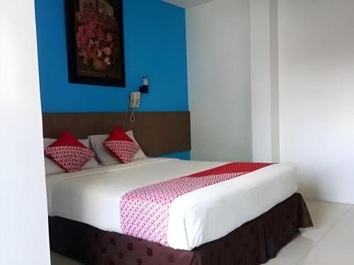 Кровать или кровати в номере Cassadua Hotel & Residence
