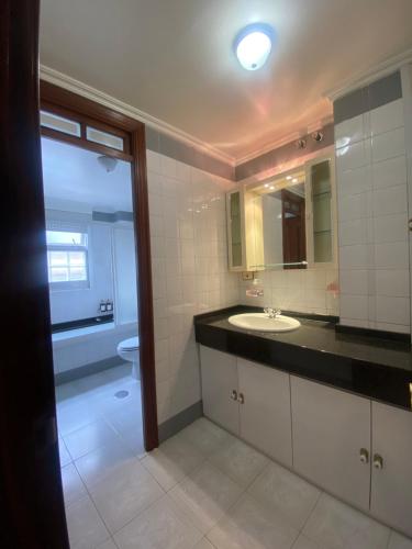 a bathroom with a sink and a toilet at Apartamento Ponte Stay 33 in Ponteareas