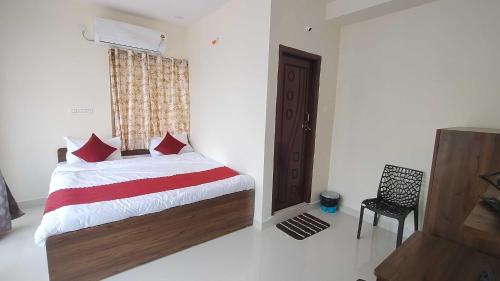 Ένα ή περισσότερα κρεβάτια σε δωμάτιο στο Hotel O The Dream Inn