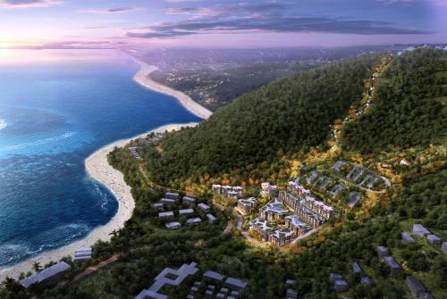 an aerial view of a resort next to the ocean at Wyndham Garden Phuket Kamala in Kamala Beach
