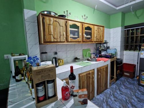 Kuchyň nebo kuchyňský kout v ubytování Appart Chambre Salon meublé