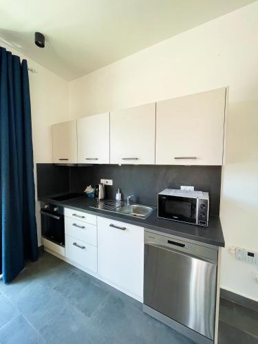Cucina o angolo cottura di Tropical apartments in The Soul 400m from Paje beach - Managed by KSN