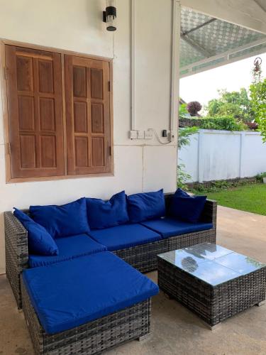 Χώρος καθιστικού στο Cozy house in Vientiane