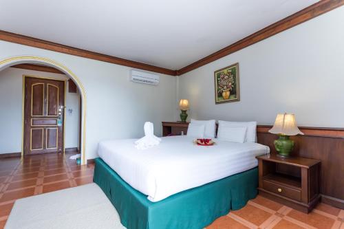 Katil atau katil-katil dalam bilik di Erawan Hotel