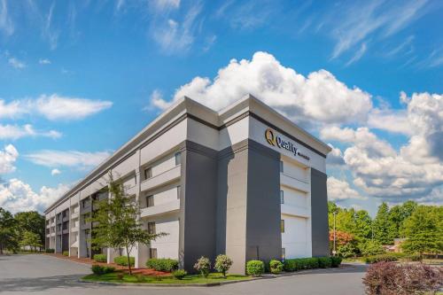 a rendering of a rendering of a hotel building at Quality Inn & Suites Raleigh Durham Airport in Morrisville