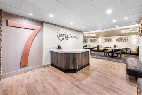 a waiting room with a large letter k on the wall at The Federal Hotel Downtown Carson City, an Ascend Collection Hotel in Carson City