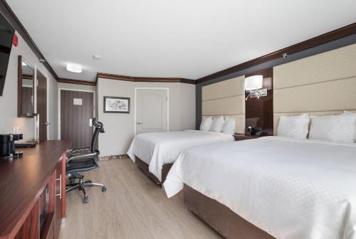 The Leo Collection Detroit, an Ascend Collection Hotelにあるベッド