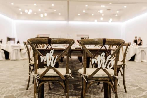a dining room with a table and two chairs at Radisson Blu Mall of America in Bloomington