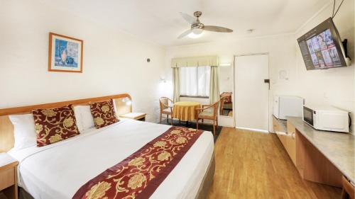 Postel nebo postele na pokoji v ubytování Espana Motel