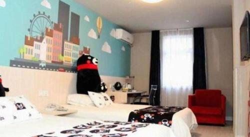 a bedroom with two beds and a room with aintendent at Jinjiang Inn Changchun Xi An Avenue Branch in Changchun