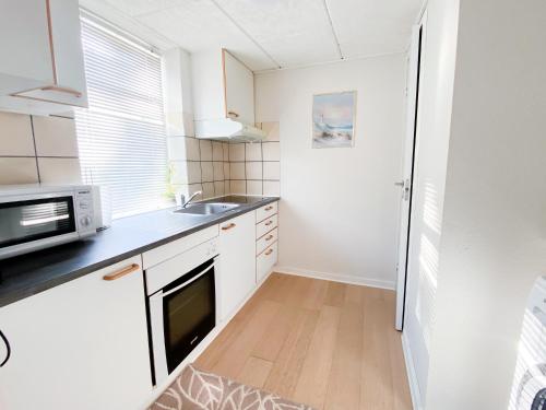 Viborg Guesthouse - Billig Overnatning Viborgにあるキッチンまたは簡易キッチン